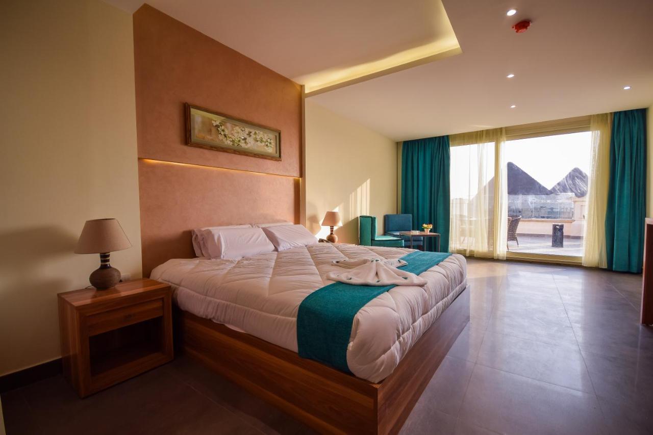 New Pyramid Quen Hotel Cairo Exterior foto
